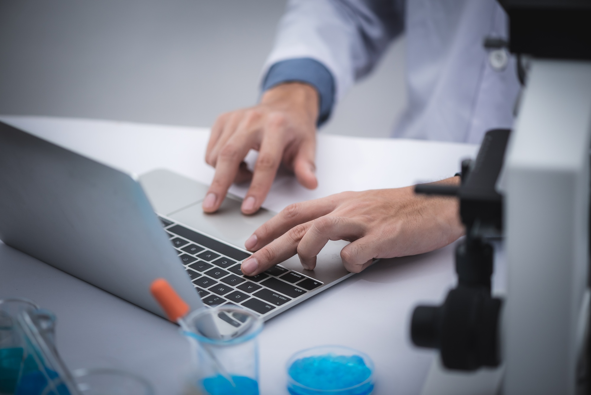 Medical scientists are analyzing data in the laboratory.