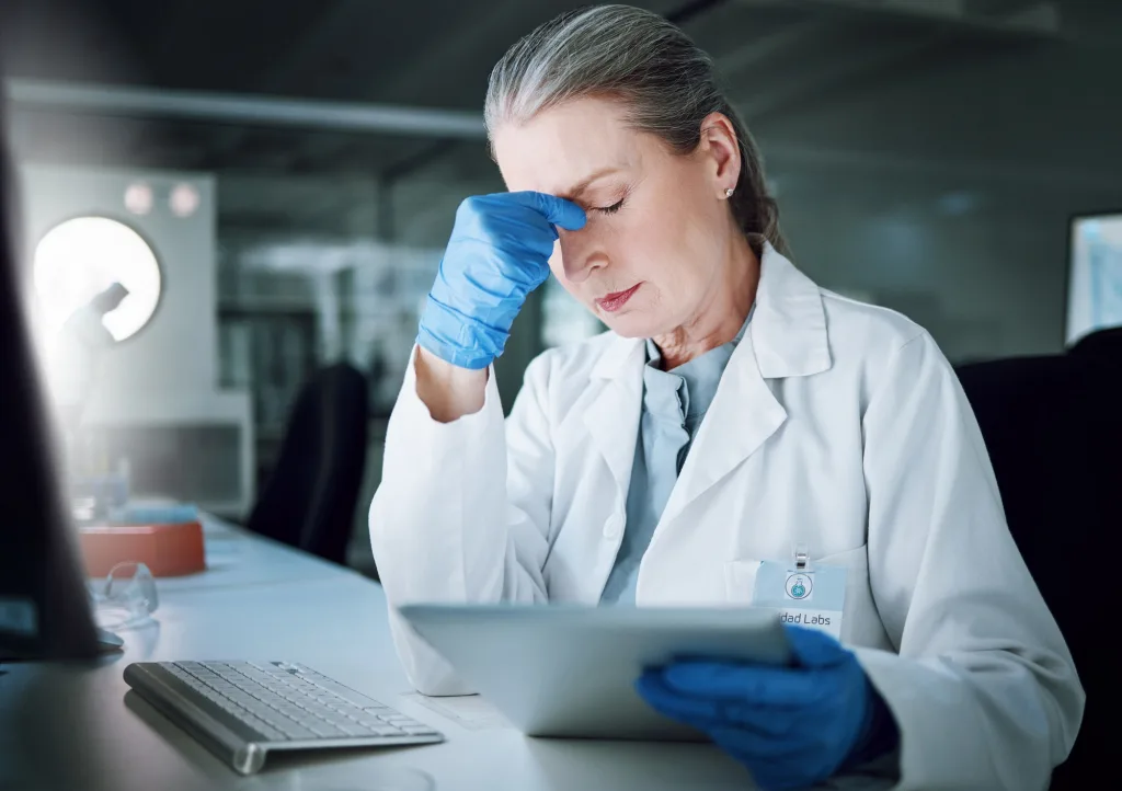 Tablet, headache and lab scientist, woman and frustrated with 404 error, software fail or science m